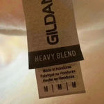 Gildan merry Christmas sweatshirt size medium. Photo 11