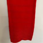 Sexy Black and Orange/Red crisscross back stretch knit dress. Photo 3