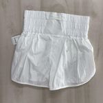 Free People nwt MOVEMENT the way home smocked shorts workout white M travel Photo 1