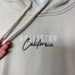 Hollister EUC ‎ Co women’s tan cream stitch decal pullover fleece lined hoodie M Photo 2