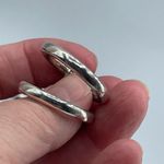 Boutique Sterling silver hoops simple round bar locking. Photo 1