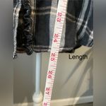 Anthropologie  Pilcro Ruffled Buttondown Shirt in a black, cream, and pink plaid Photo 6