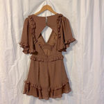 Saints + Secrets ‘Swiss Dot’ Ruffle Dress with Side Cut Outs and Deep Vneck Photo 6