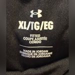 Under Armour Women’s  leggings - size XL - black w/neon green stitching - pockets Photo 8