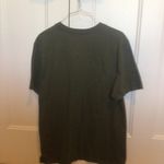  Women’s size medium olive green Nike T-shirt Photo 2