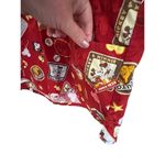 Disney short sleeved V-neck scrub top with Mickey and Minnie Mouse size medium Photo 3