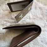 Coach x PEANUTS 3-IN-1 Wallet Signature Canvas Snoopy Print CBK56 Tan/Multi NWT Photo 1