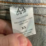 Unif  frayed distressed light wash jean jacket in size xs Photo 6