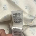 We Wore What Revolve  Ivory Blue Floral Cut Out Belted Mini Denim Skirt Large NWT Photo 11