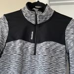 Reebok  Black and White Zip Up Jacket with Sporty Trim Photo 1