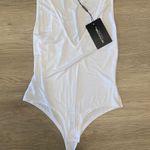 Pretty Little Thing Basic White Jersey Plunge Neck Thong Bodysuit Photo 3