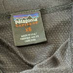 Patagonia  Vintage Women’s Size XS Black Capilene Quarter Zip Long Sleeve Top Photo 3