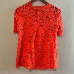 HD in Paris  Vibrant Orange Lace Blouse Photo 2