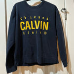 Calvin Klein Jeans  Blue‎ Boxy Sweatshirt with Yellow Logo Photo 0