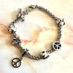 Silver tone bird flower peace owl charm bracelet Photo 0