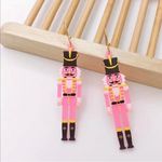 Boutique Handmade pink and black wooden nutcracker earrings with gold accents #holiday Photo 2