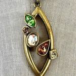 Gold tone rhinestone pendant necklace on cord Photo 1