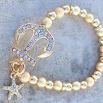 Boutique Gold Tone Textured Anchor Starfish Beach Bracelet Photo 0