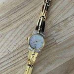 Citizen Eco-Drive Ladies Watch Crystals Pearl Dial Gold Tone Bracelet Solar Photo 2