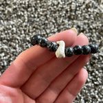 Black with white penguin charm beaded bracelet Photo 3