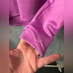 Under Armour NWT Women’s Purple  long sleeve top. Size large. Cold Gear fitted. Photo 6