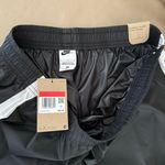 Nike Women's Sportswear Repel Essential Woven Jogger Pants Photo 8