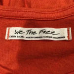 We The Free Free people  anytime peplum tank top in an orange color Photo 5