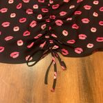 Cato  NWT Black and Pink Lip Puff Sleeve Top with Ruched Tie Front Elastic sleeve Photo 3