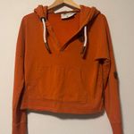Wanakome  Vibrant Orange Hoodie with Rope Drawstring Photo 0