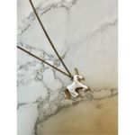 Charming Charlie  reversible unicorn necklace Photo 1