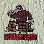 Nintendo NWOT Donkey Kong Yellow Graphic Tee size L Photo 1