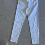 Lilly Pulitzer the image is a pair of Worth Skinny Pants in white with pearl embellishments. Product Details Style: Worth Skinny Pants Color: White, also referred to as Resort White Features: The pants have pearl embellishments along the bottom of the Photo 17