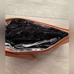 Adrienne Vittadini Studio Charging Wallet Wristlet in Peachy Pink Color Photo 6