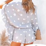 Storia  medium v-neck grey romper white embroidered starts ruffle batwing sleeves Photo 2