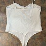EXPRESS women’s cream cut-out body suit Photo 2