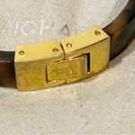 Michael Kors Michael Kors Simulated Tortoise Gold Tone Hinged Bangle Bracelet Photo 1