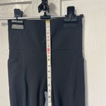 Athleta Salutation Stash pocket black Flare leggings size XS Photo 8