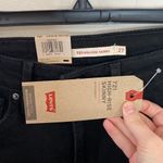 Levi's Levi’s 721 solid black distressed high rise skinny jeans size 27 Photo 5