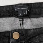 Universal Standard Mid Rise Skinny Seine Jeans in Distressed Black Photo 2