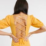 ASOS Yellow Seersucker Puff Sleeve Lace Up Back Romper Photo 1