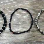 Set of Three Beaded Bracelets in Black and Silver and gold Photo 0