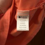 FIGS  Women’s Catarina One Pocket Scrub Top in color Hot Coral Size XS Photo 3