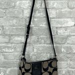 Coach Signature Logo Stripe
Swingpack Crossbody Leather Trim
Black Tan Bag Photo 1