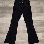 Black Ripped Flare Jeans Size 25 Photo 1