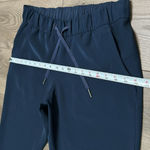 Lululemon  On The Fly‎ Crop Woven True Navy Capri Pants Size 10 Photo 6