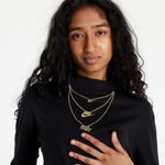 Nike  Gold Chain Black Long Sleeve Tee Photo 1