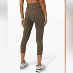 Lululemon Invigorate HR Crop 23” size 2 in dark olive Photo 1