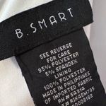 B. Smart  Ball Gown with box pleats open back large floral design Classic S Photo 8