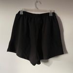 Princess Polly high waisted black shorts Photo 2