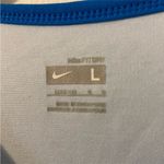 Nike  light‎ blue  athletic top Photo 1